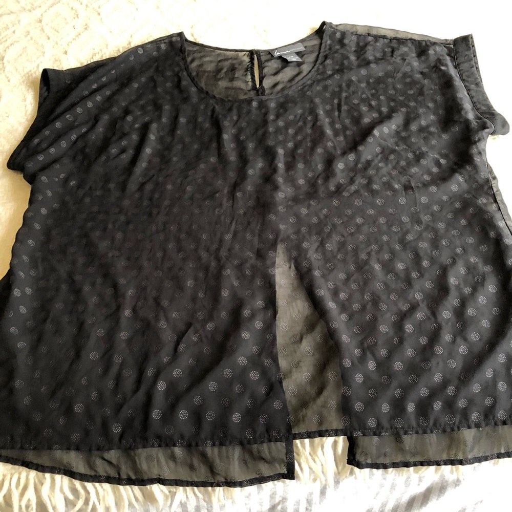 Sheer black blouse